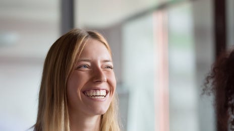 Woman attending a language lesson with Berlitz Canada with the help of tuition reimbursement