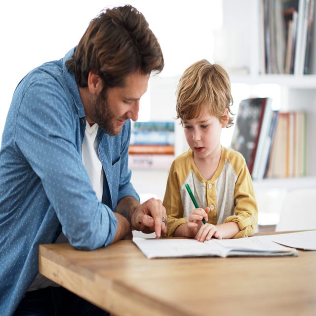 kid attending a private language course with his father