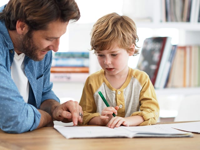 kid attending a private language course with his father