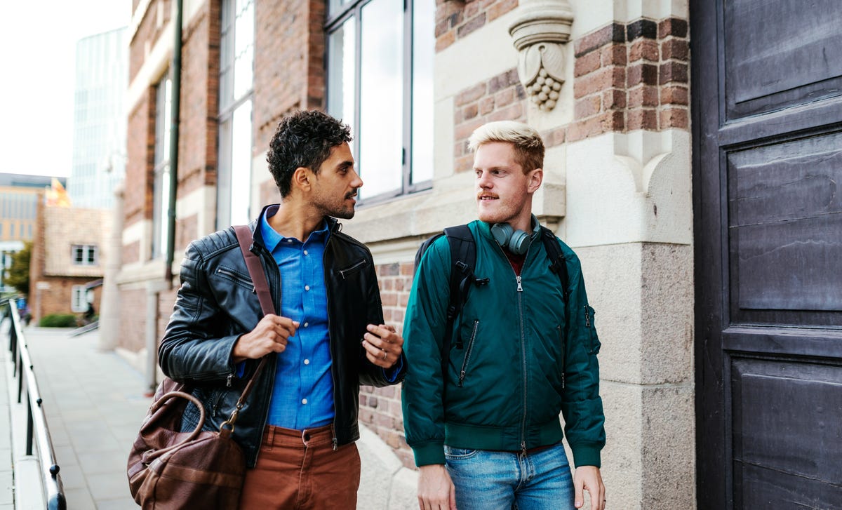 men speaking in mandarin before their language classes