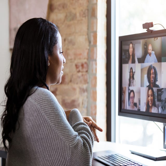woman joining her online group classes from home