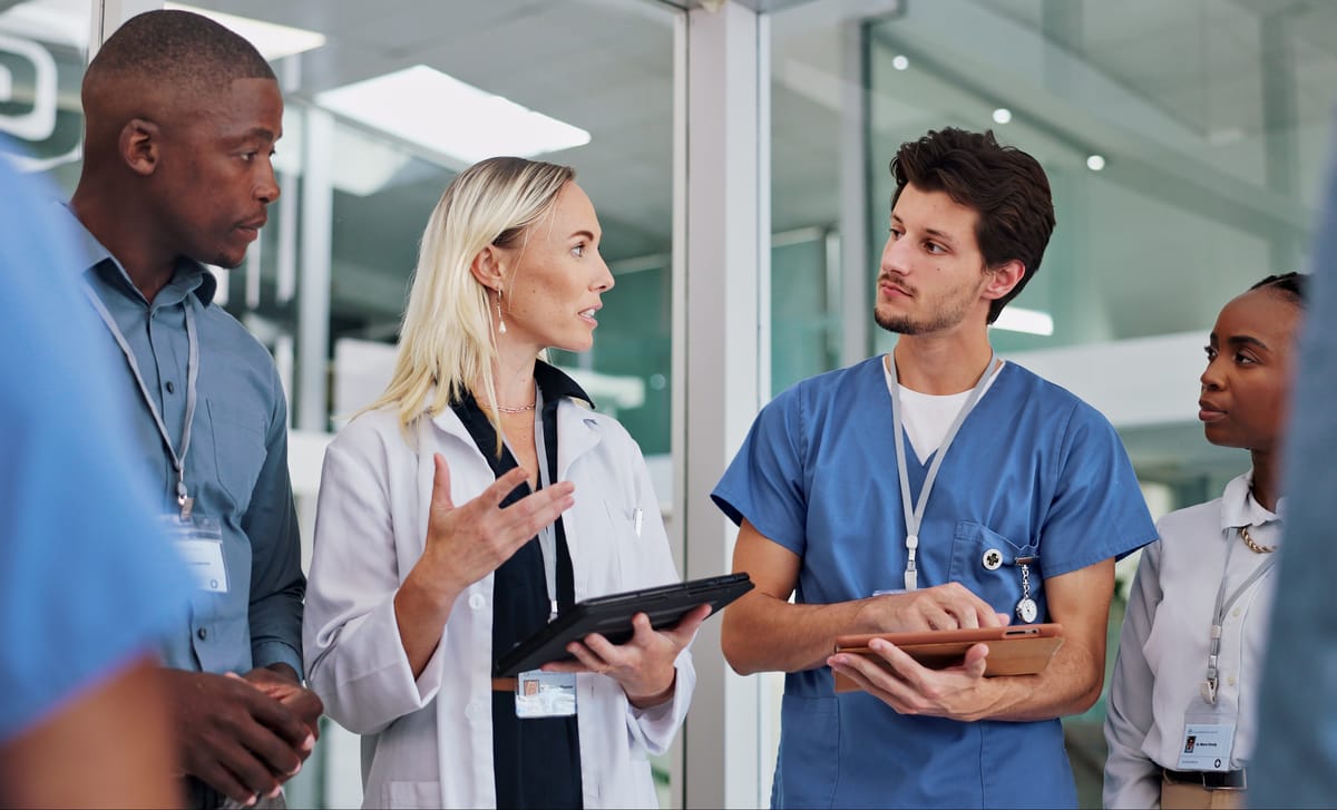 Healthcare coworkers chatting with each other after their healthcare language training with Berlitz Canada