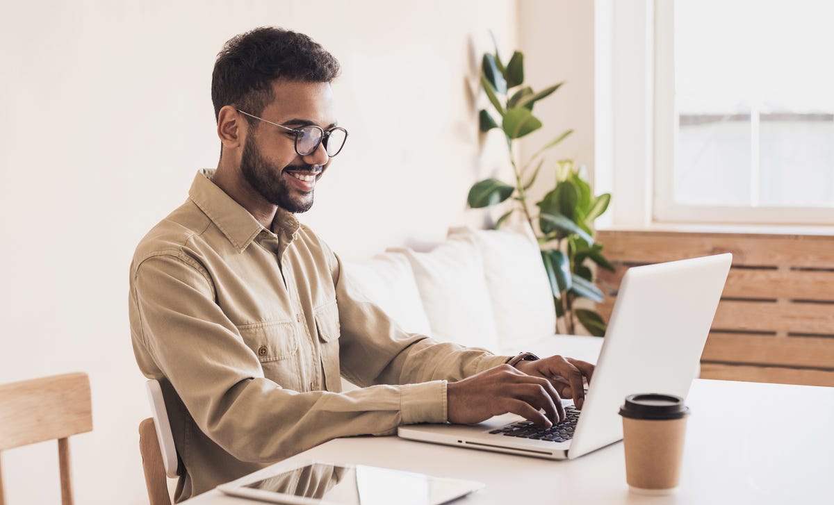 man learning a language online with cyberteachers