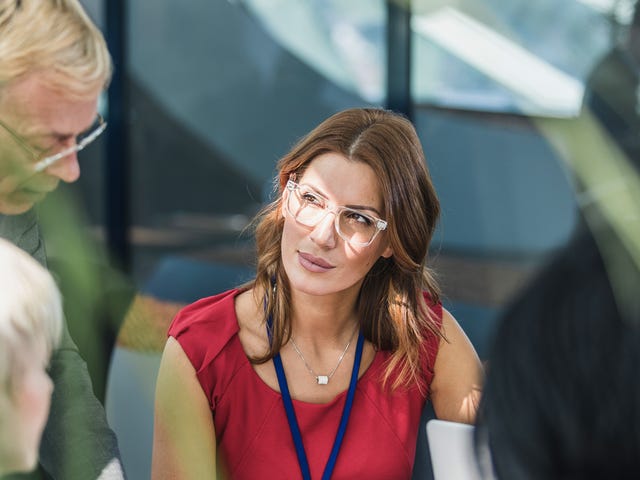 colleagues engaging in a conversation in korean