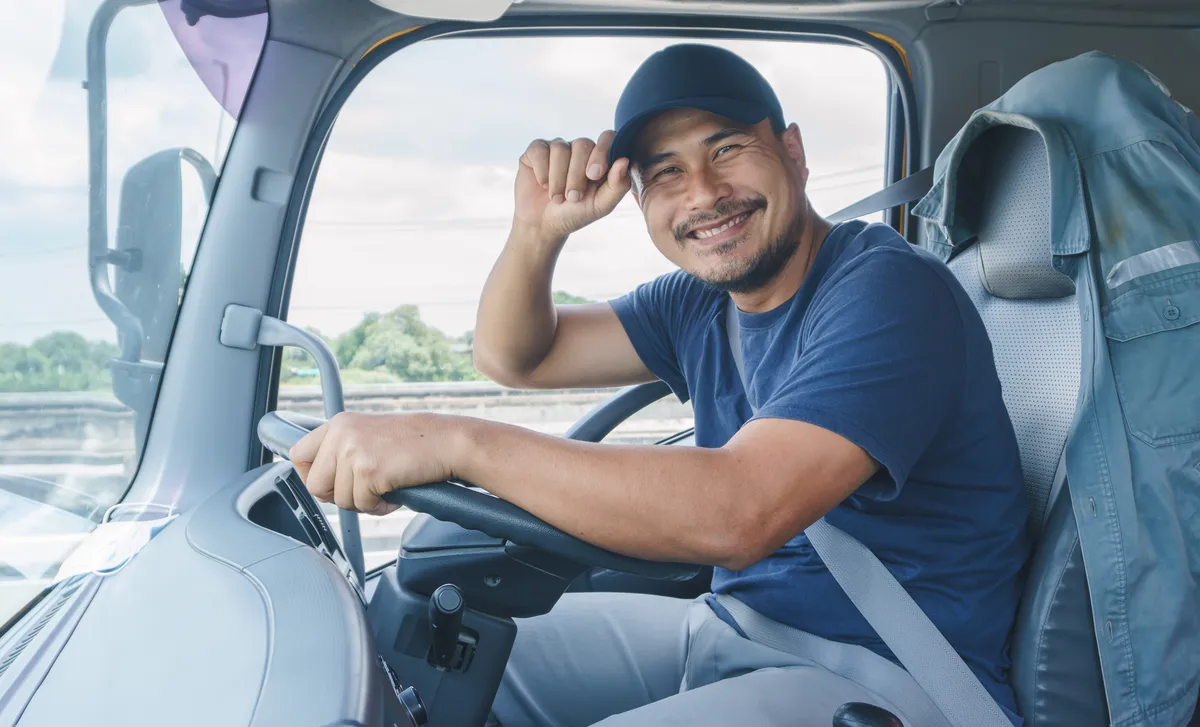 Man in a truck after his logistics language training with Berlitz
