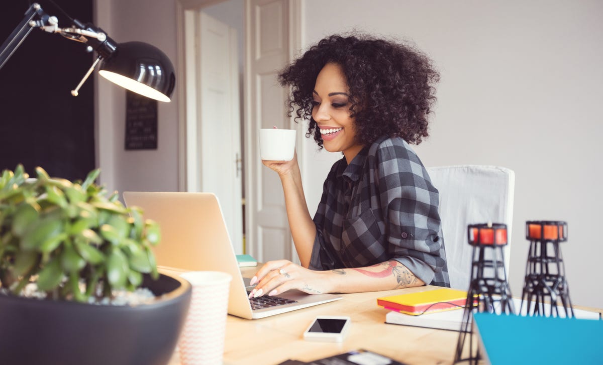 woman taking an online intensive language class at home