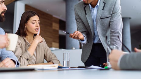 business colleagues learning french together