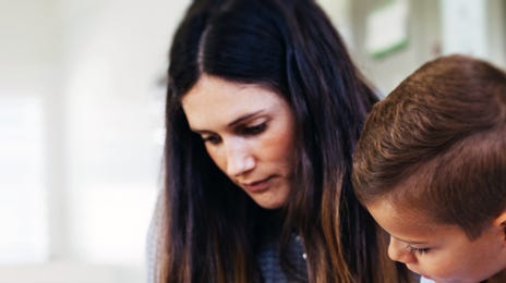 kid attending a private language course with an instructor