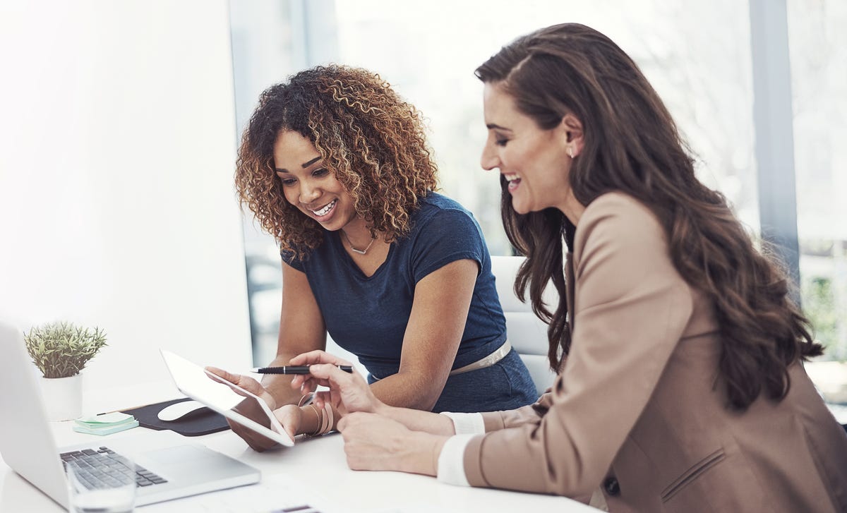 women learning a new language with their private online classes from home