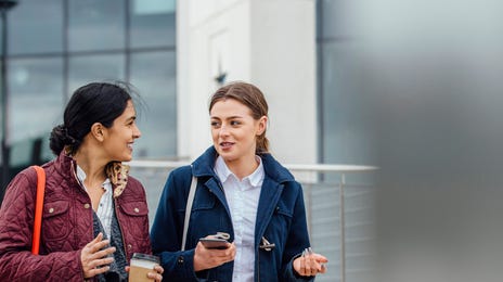 women walking to their intensive french language class together