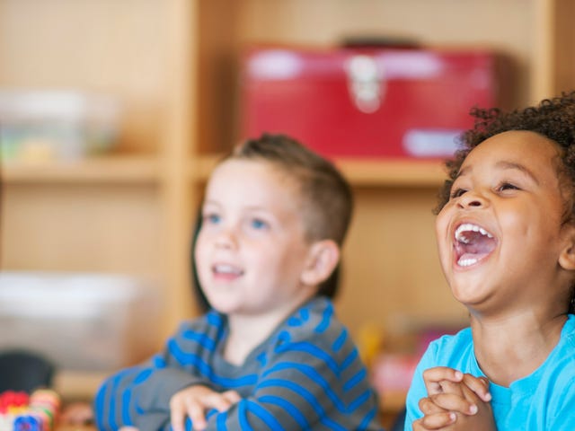kids learning english in a group with an instructor