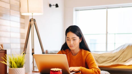 woman learning korean online from home