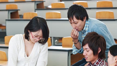 students attending a japanese group class together