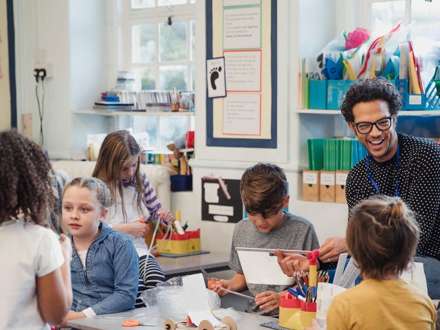 kids and teens learning language in a group