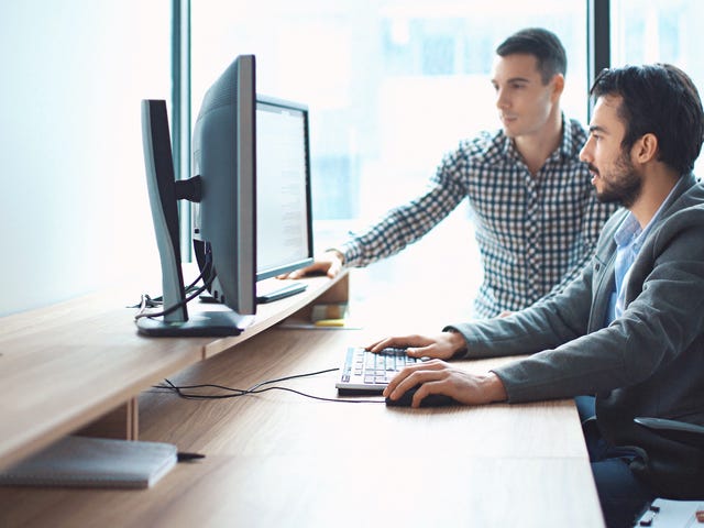 colleagues taking online language classes from the office