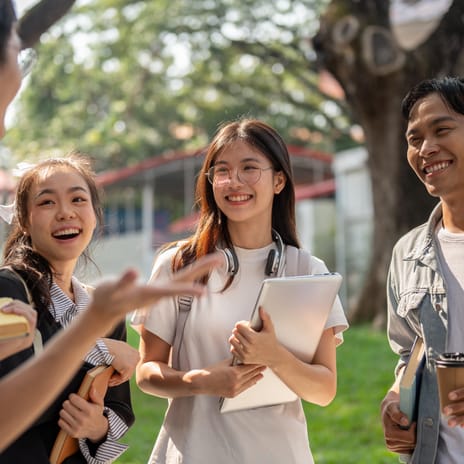 Group of teenagers chatting outside before their English lesson for kids and teens with Berlitz Canada