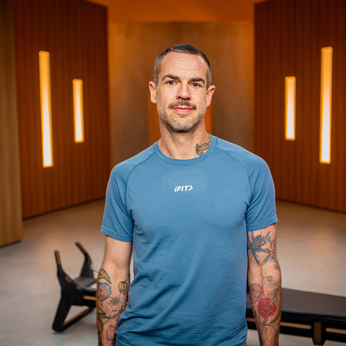 Meet Abe Ahern, iFIT Pilates instructor and coach of the Strong Foundations and Base to Burn reformer series on the NordicTrack reformer.