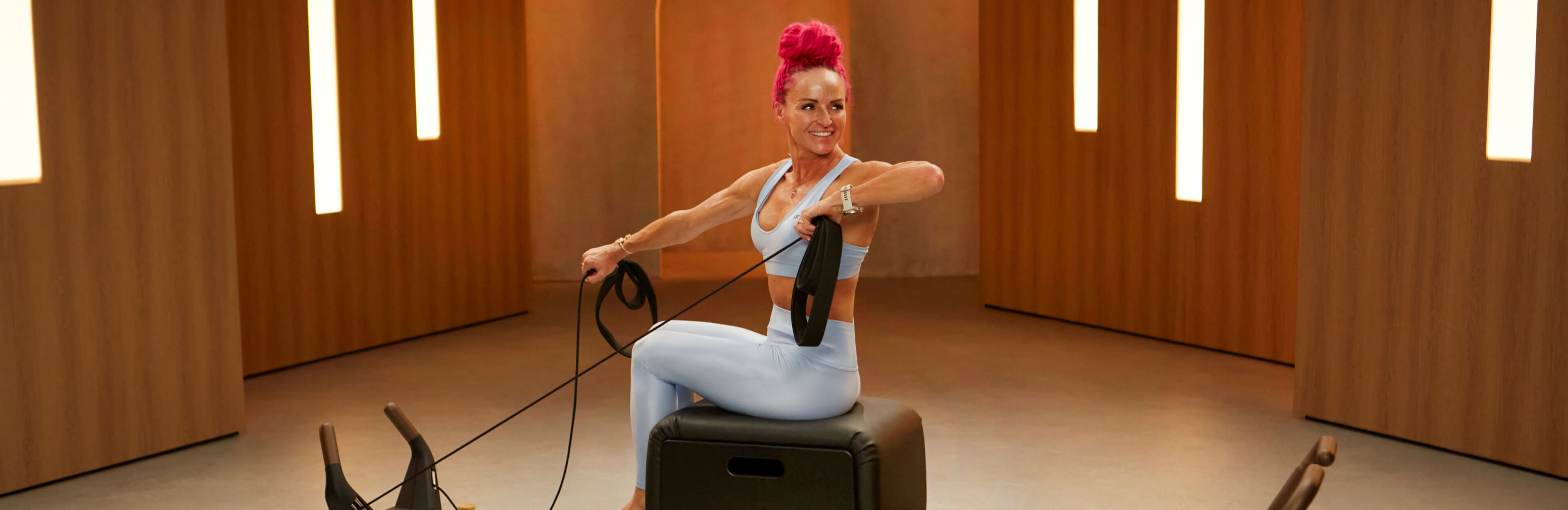 Meet Ashley Paulson and get started with The Resilient Body, an 8-workout beginner reformer Pilates series blending strength, cardio, and control.