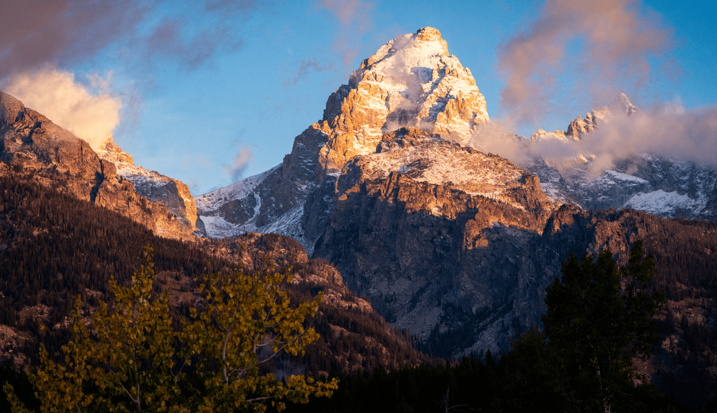 A view of the Grand Tetons at sunset.