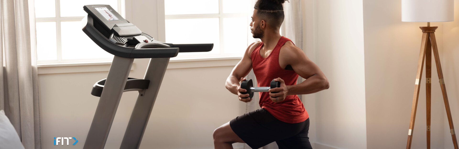 Woman does an iFIT full body workout