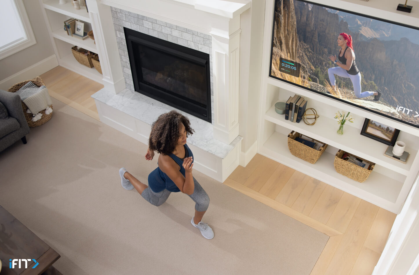 Woman does lunges during her bodyweight workout