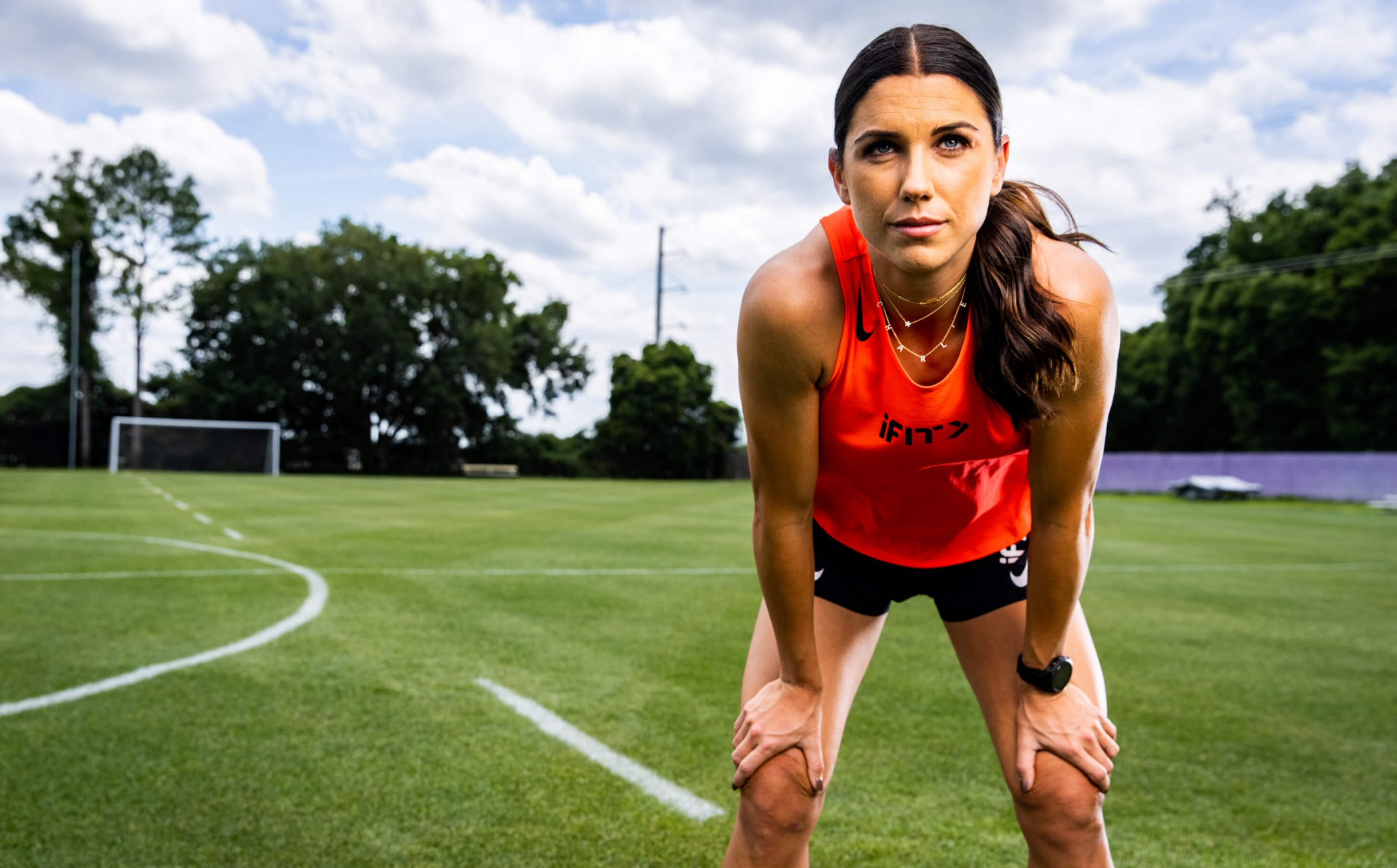 iFIT Trainer Alex Morgan coaches a cardio workout