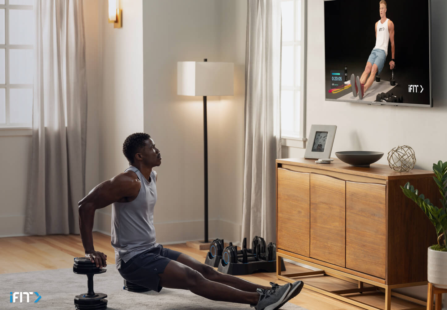 Man does a tricep dip during a bodyweight workout