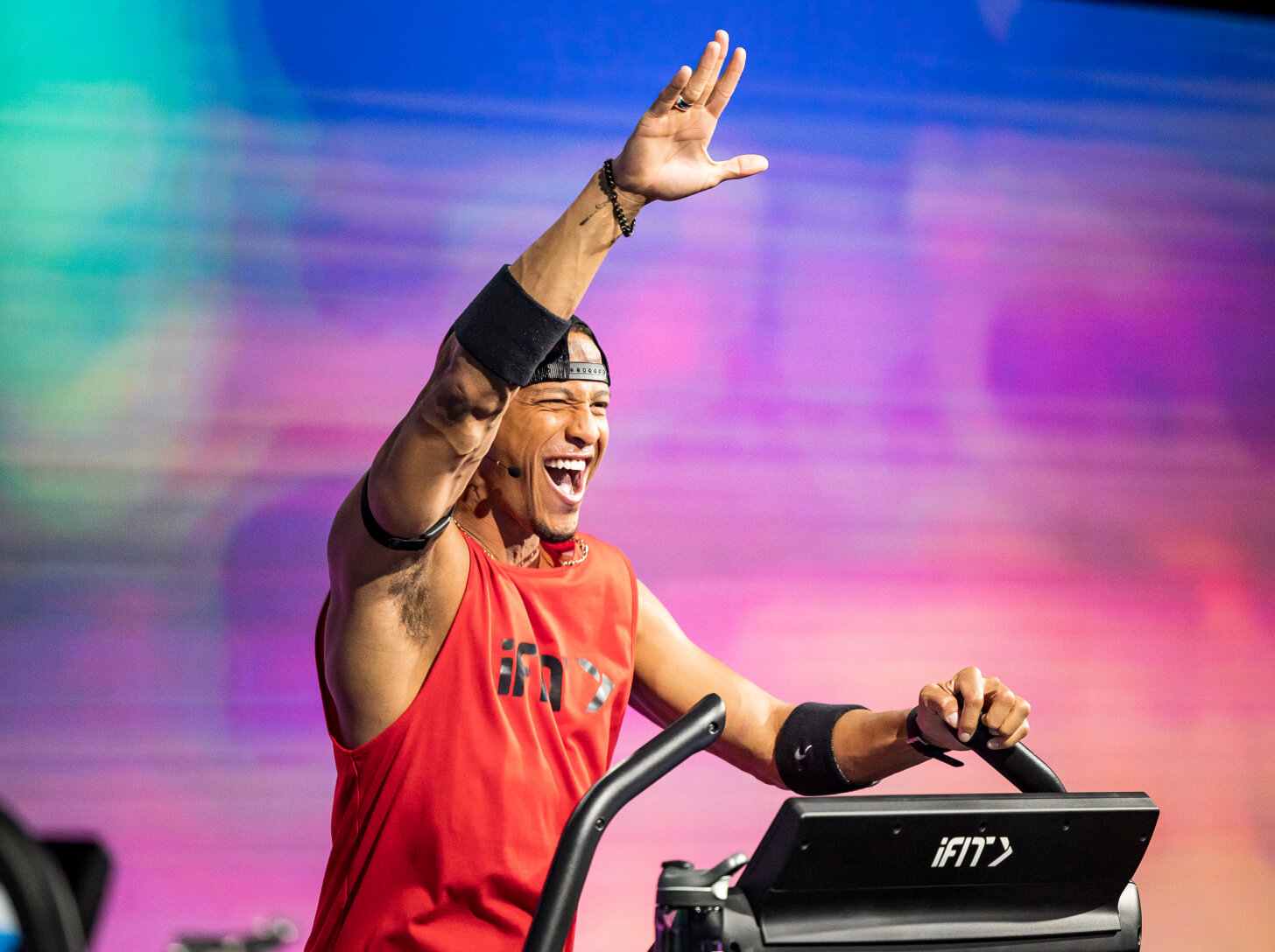 iFIT Trainer Jonnie Gale coaches a running workout