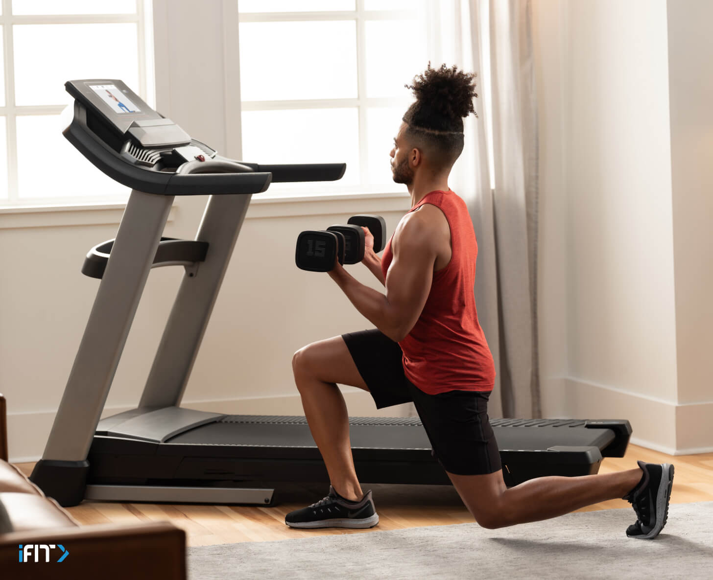 Man completes an iFIT lower body workout Man does an iFIT lower body workout