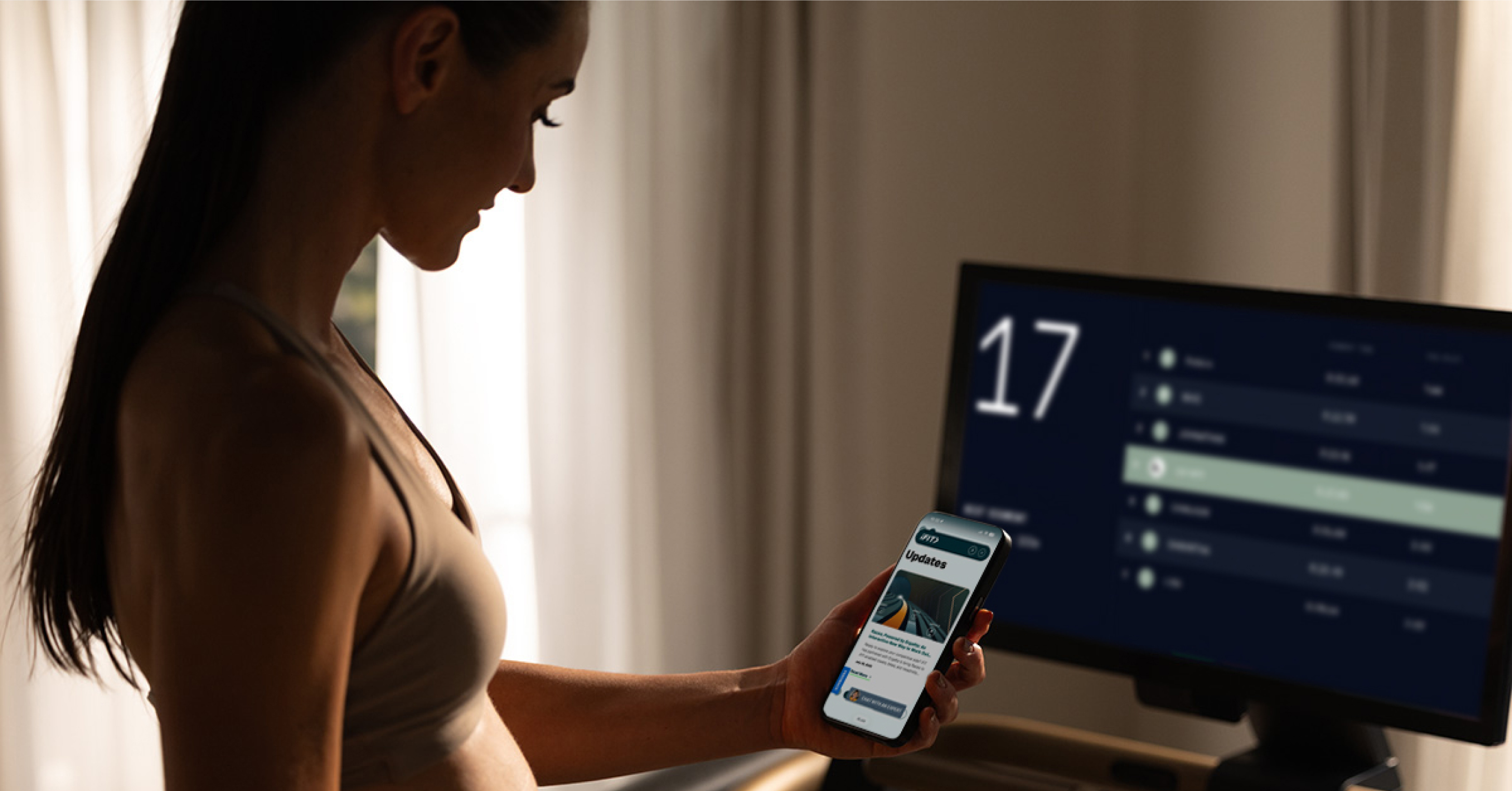 iFIT member viewing race leaderboard on NordicTrack equipment during a virtual fitness competition