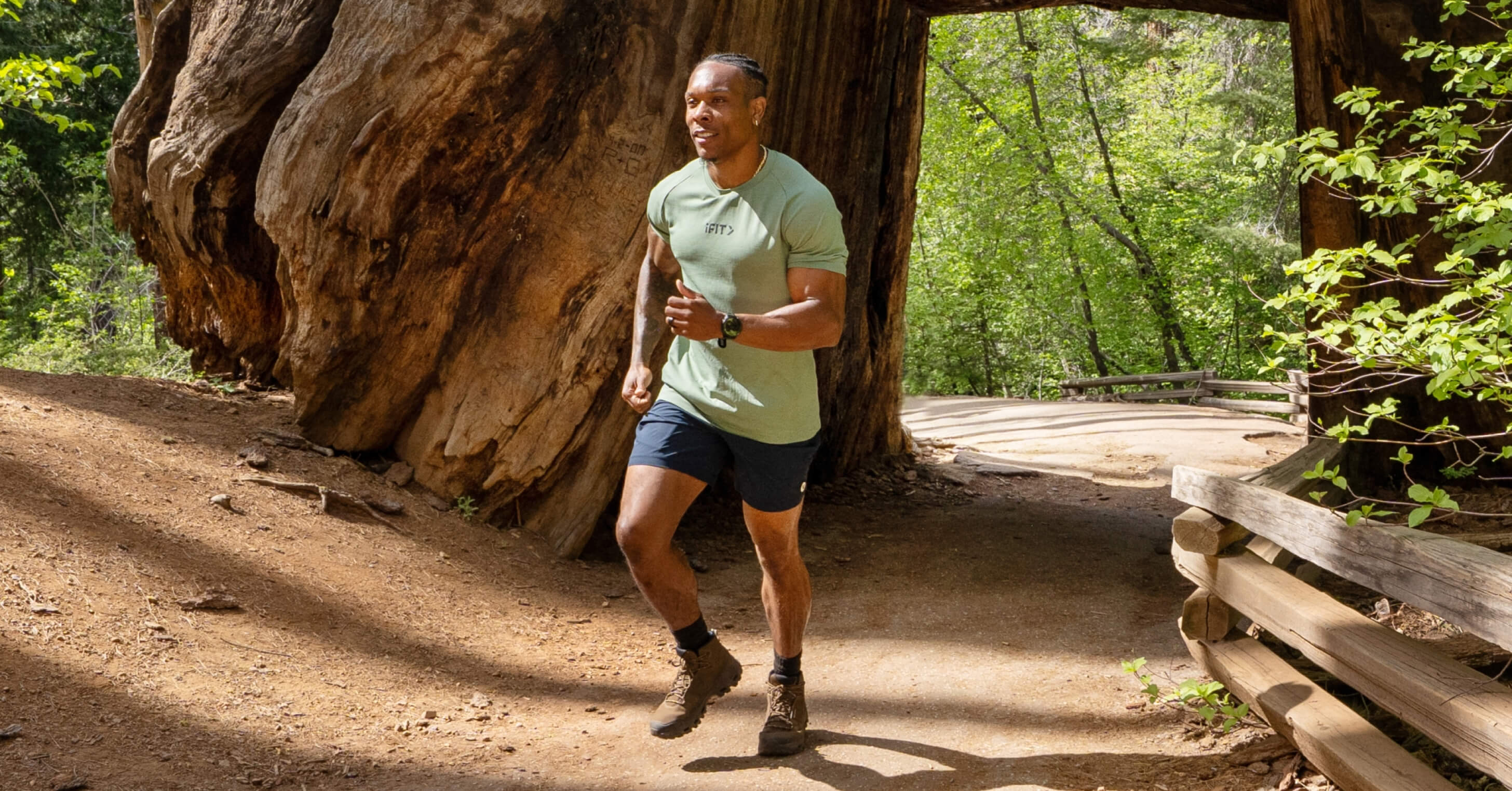 iFIT Trainer BullyJuice guides you through Yosemite’s Tunnel Tree and iconic sequoia trails in the Yosemite National Park Train to Terrain Series.