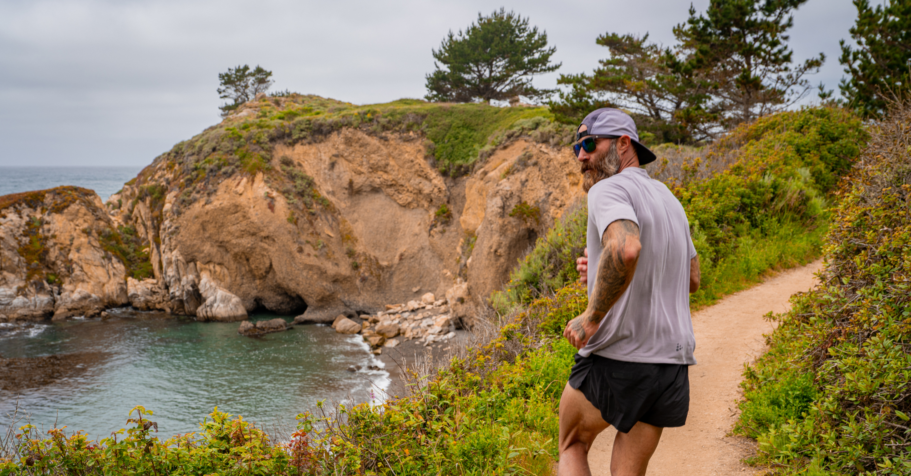 Tommy Rivs runs a rugged coastal trail above the Pacific in Northern California as part of the California season of Rivs Run Club on iFIT.