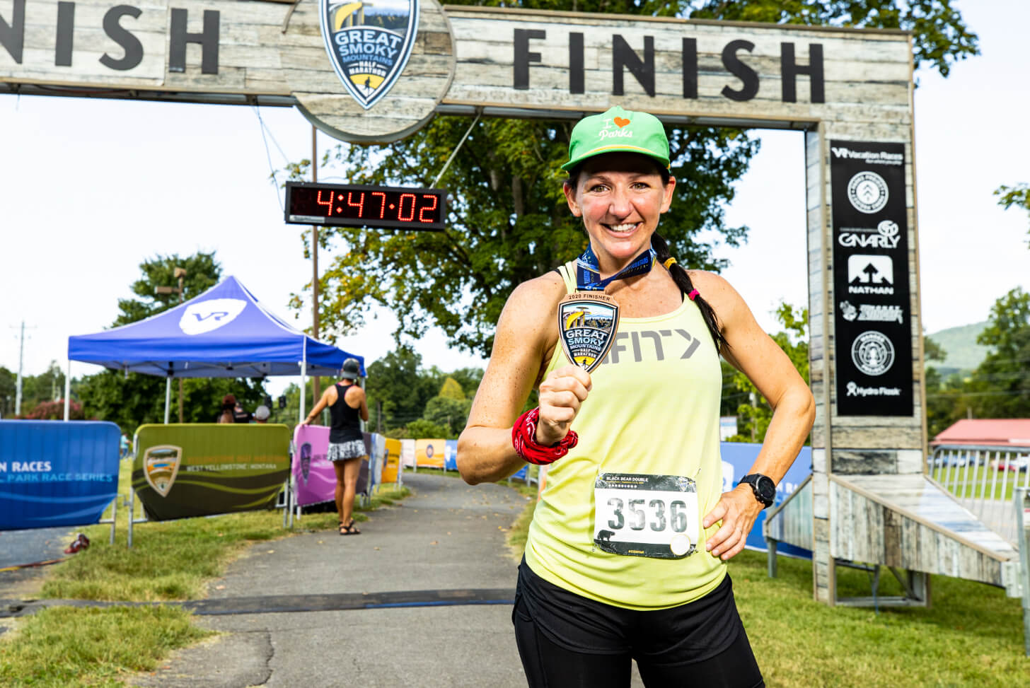 iFIT Trainer Sally McRae finishes a race iFIT Trainer Sally McRae coaches a race