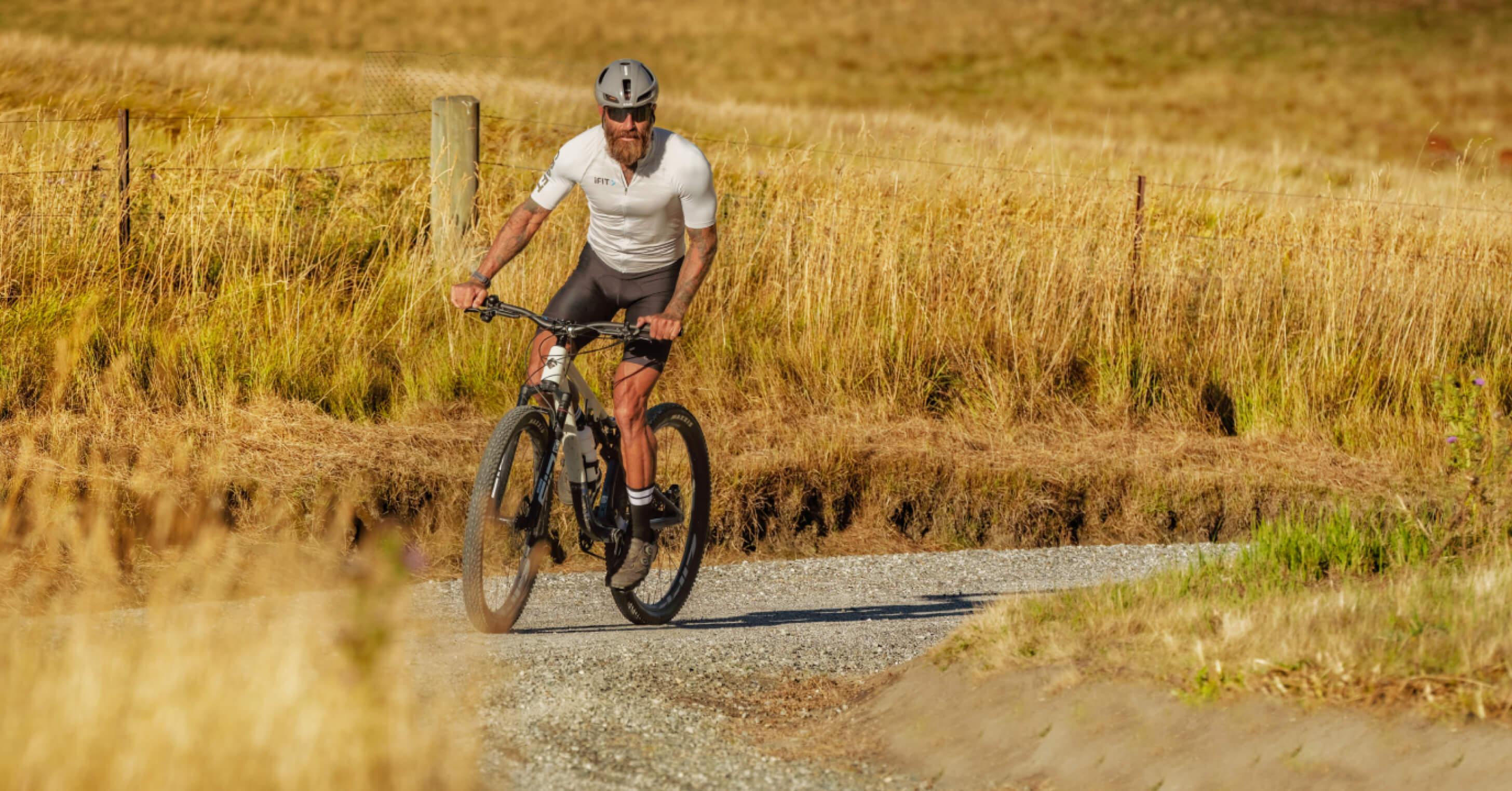 Build cycling endurance with low-intensity rides through New Zealand's landscapes. Stream the iFIT beginner bike series with Tommy Rivs.