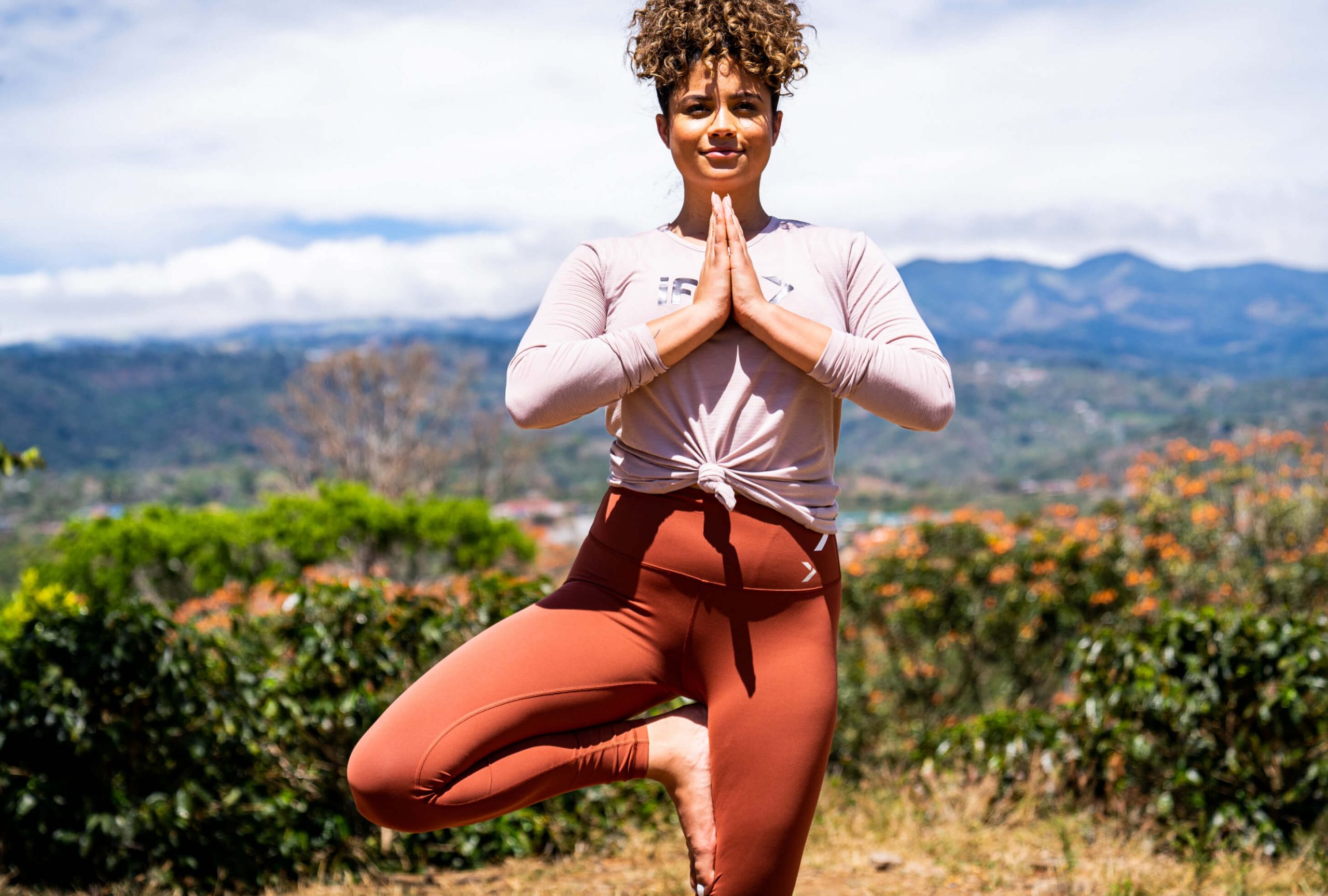 iFIT Trainer Thalia Ayres Randolph coaches a yoga workout