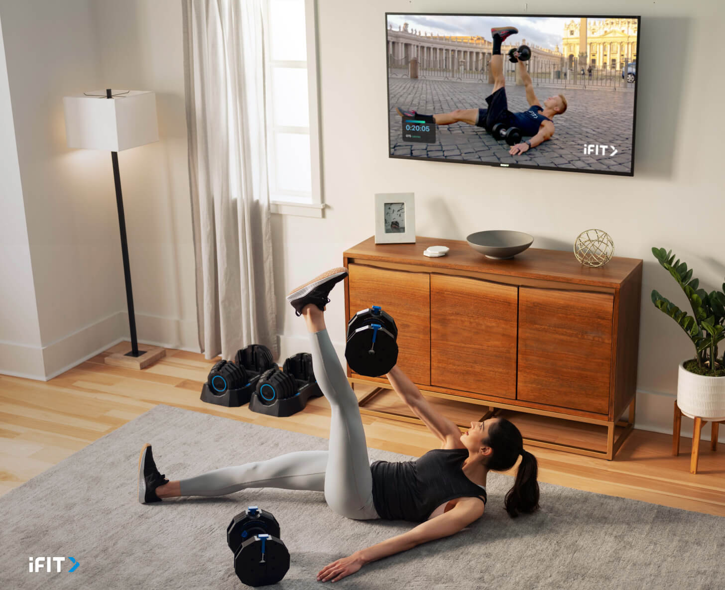 iFIT core exercise Woman does an iFIT core exercise during an ab workout