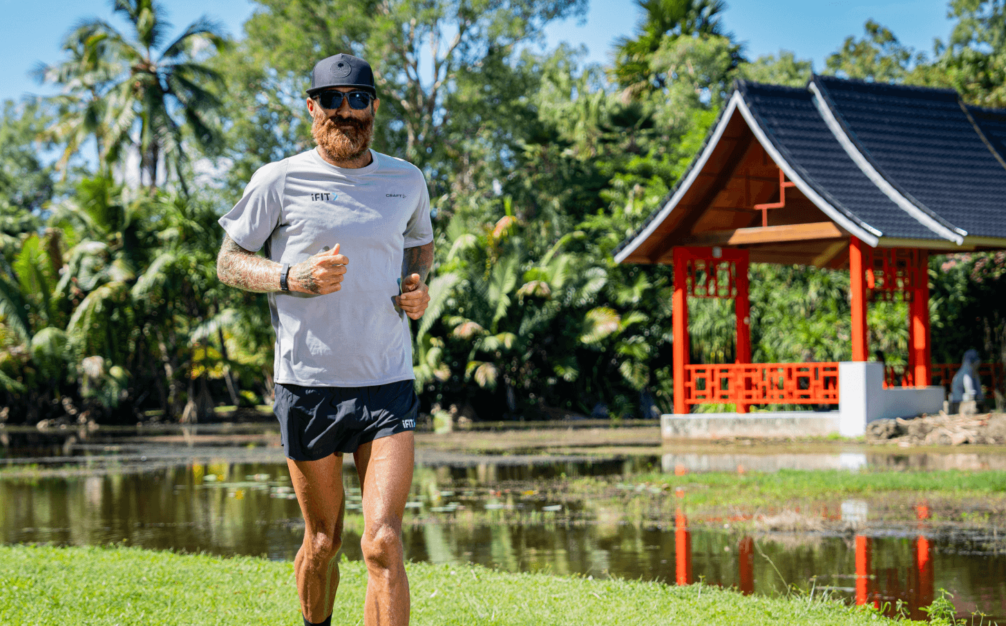 Tommy Rivs runs alongside a pond in Queensland Australia