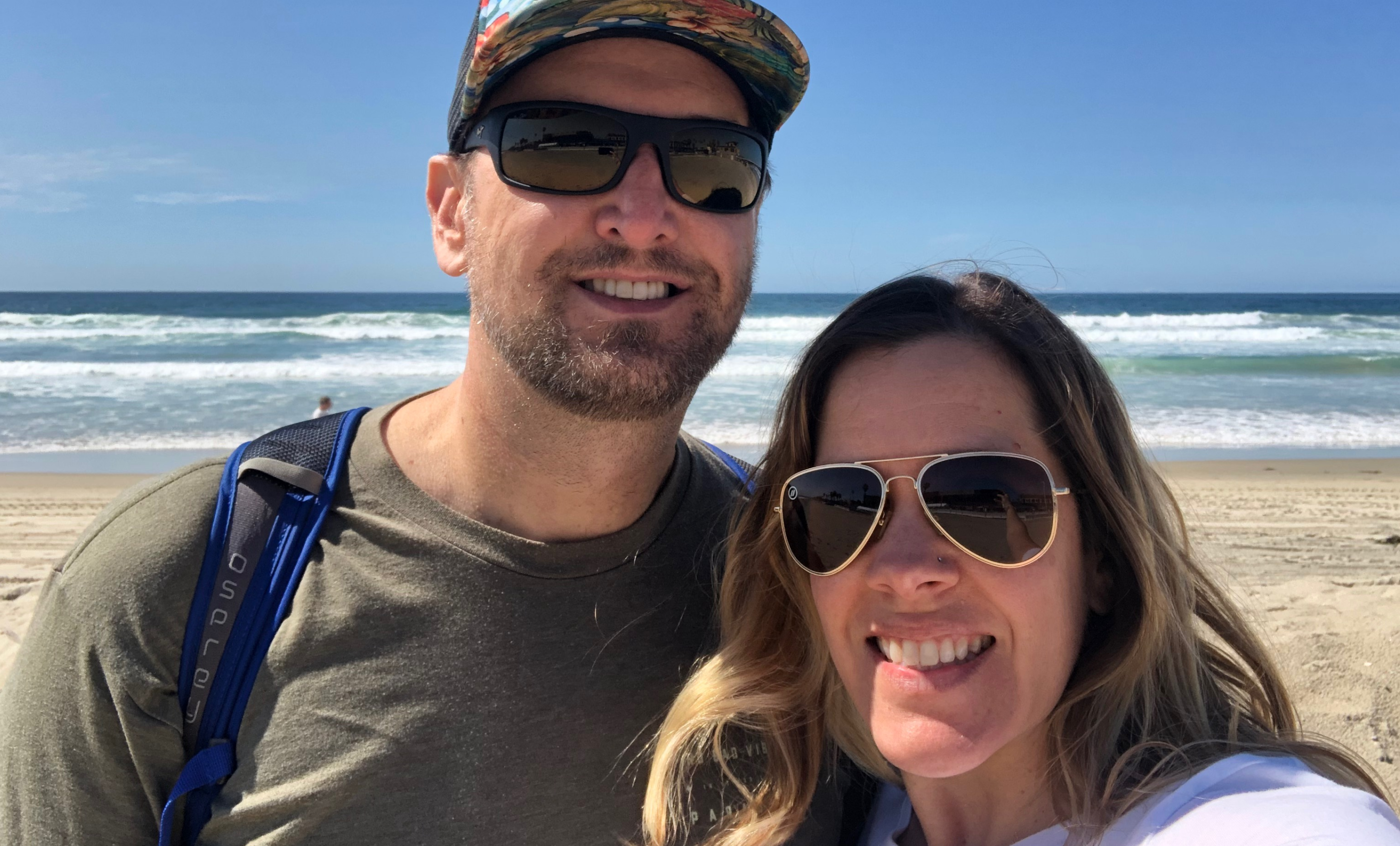 iFit Member Amy Smith and her husband on the beach iFit Member Amy Smith and her husband