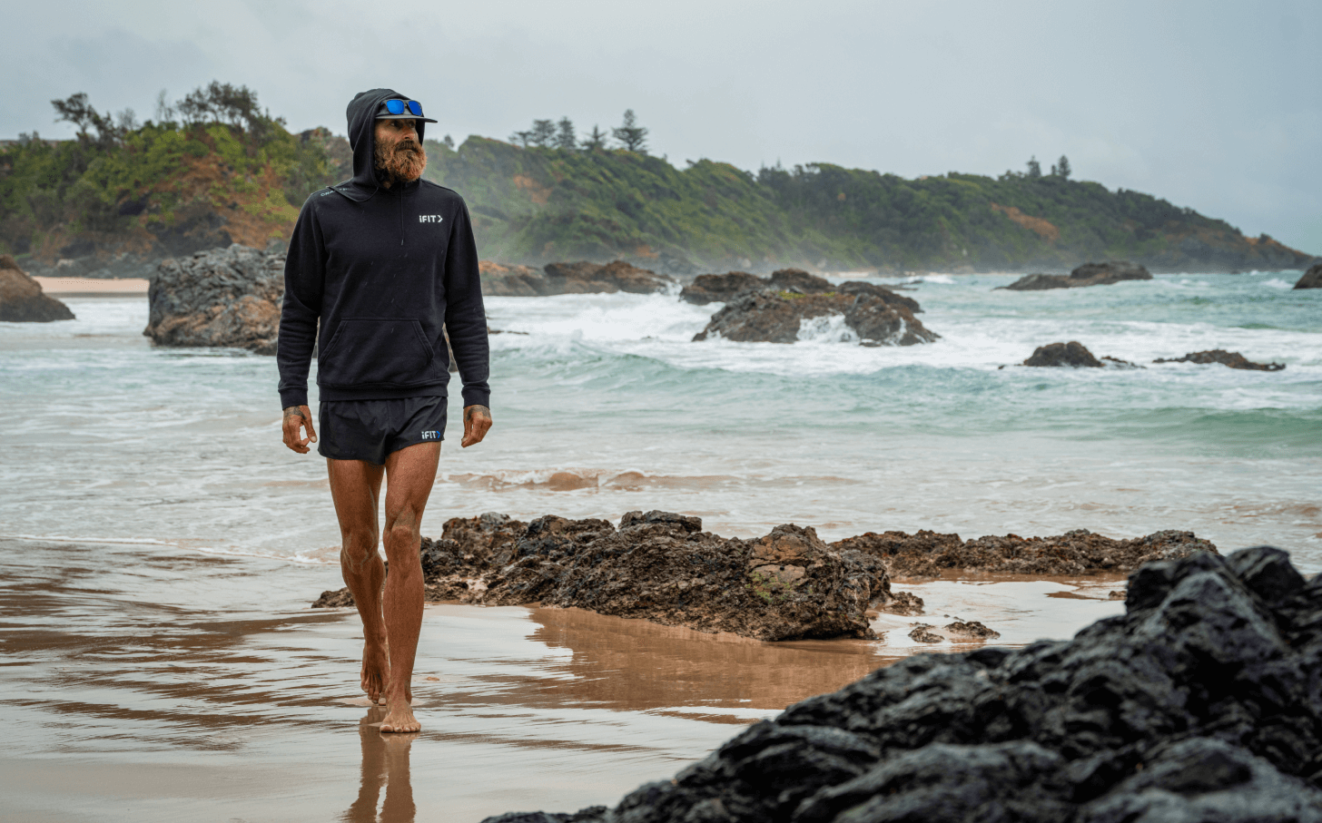 Tommy Rivs walks along the beach in Queensland, Australia.