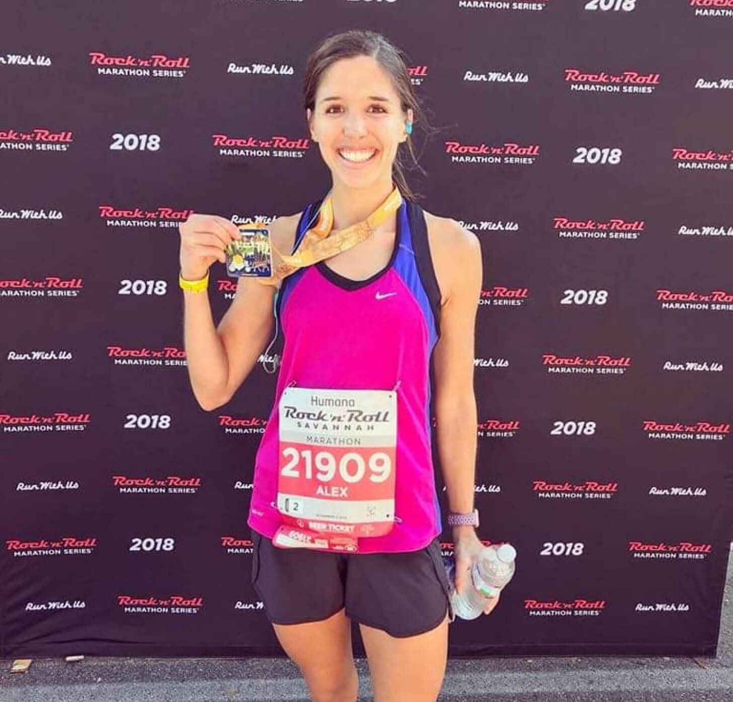 iFIT Member Alexandra Pugh finishes a race iFIT Member Alexandra Pugh runs a race