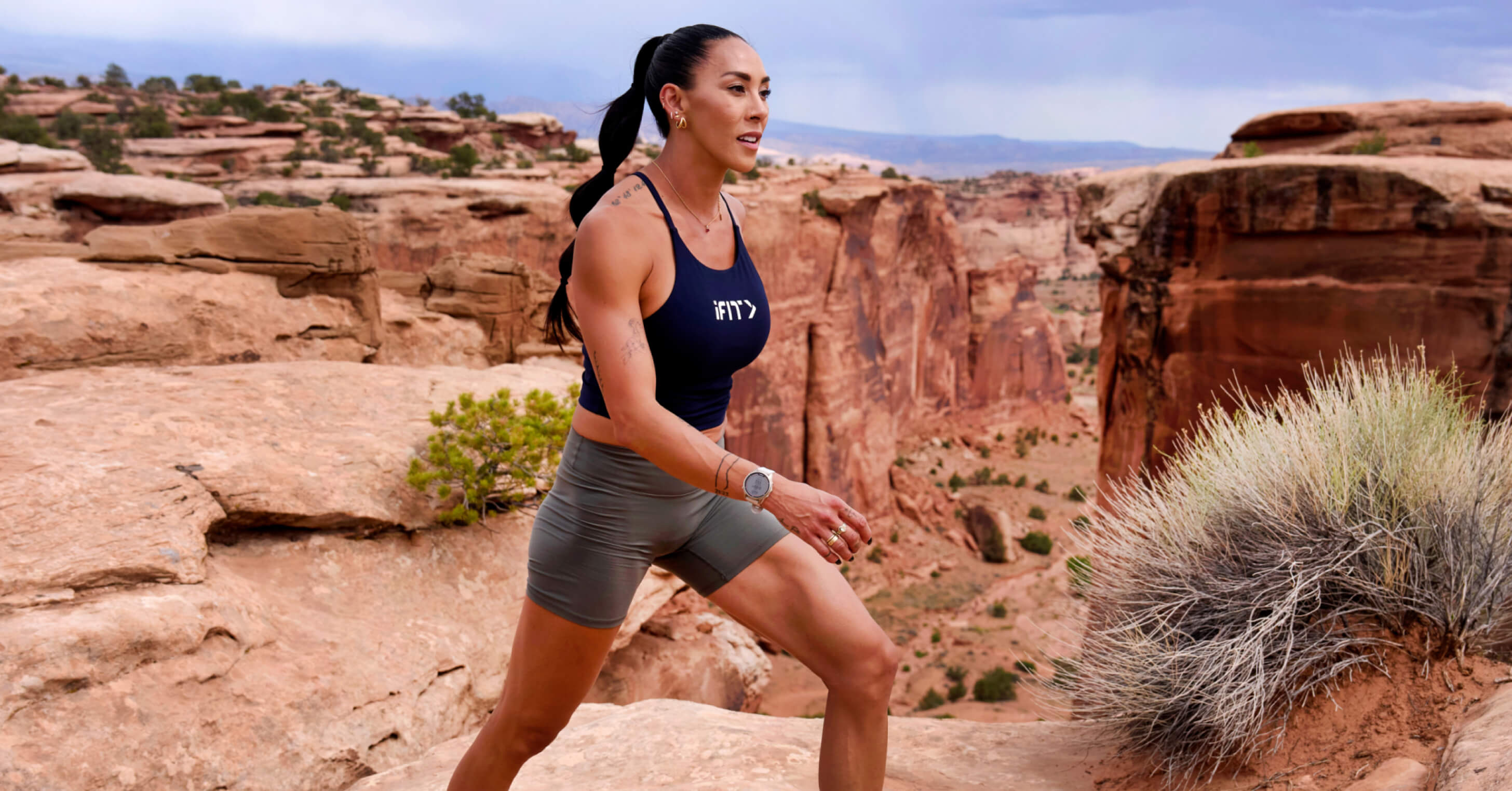 iFIT Trainer Hannah Eden leads advanced cardio treadmill workouts through Canyonlands National Park locations including Upheaval Dome and The Needles.