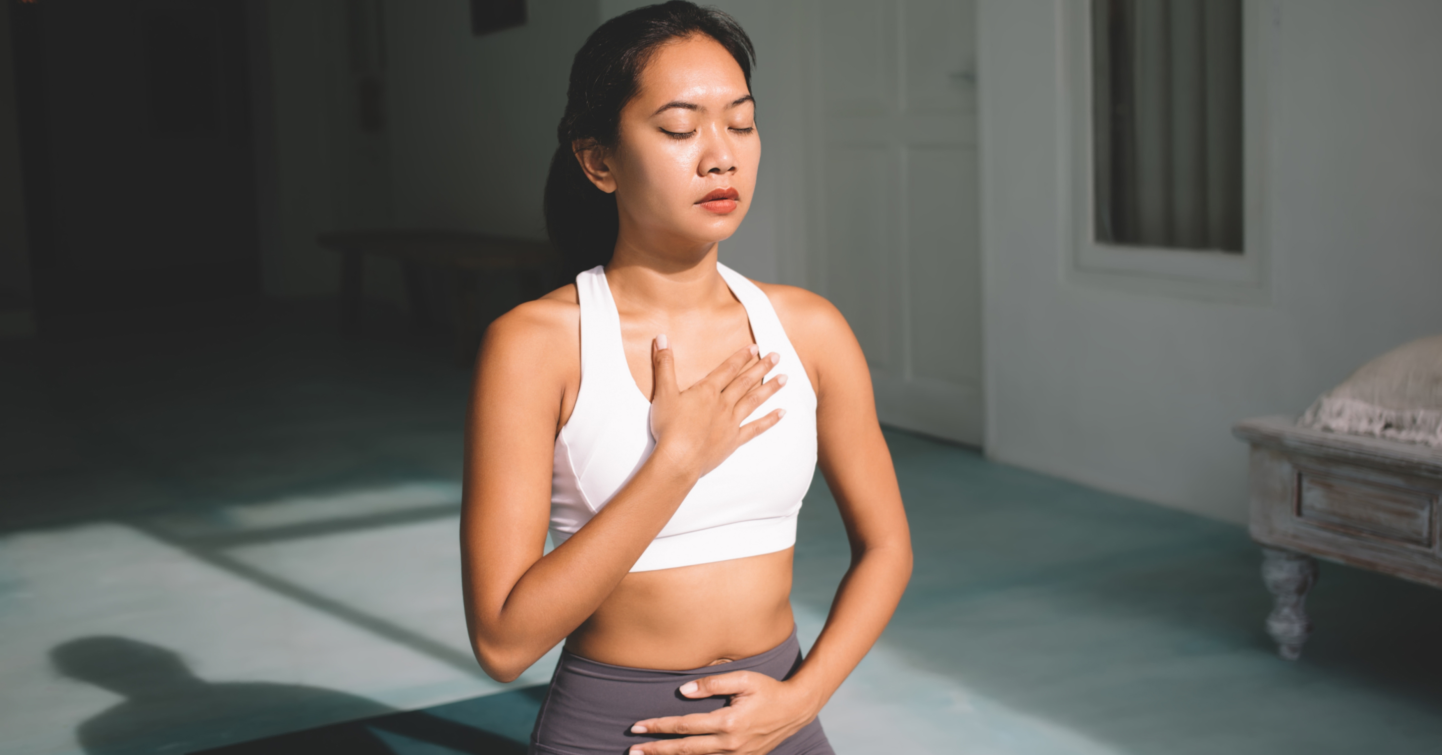 Placing a hand on your chest while breathing slowly helps activate the parasympathetic nervous system before a workout