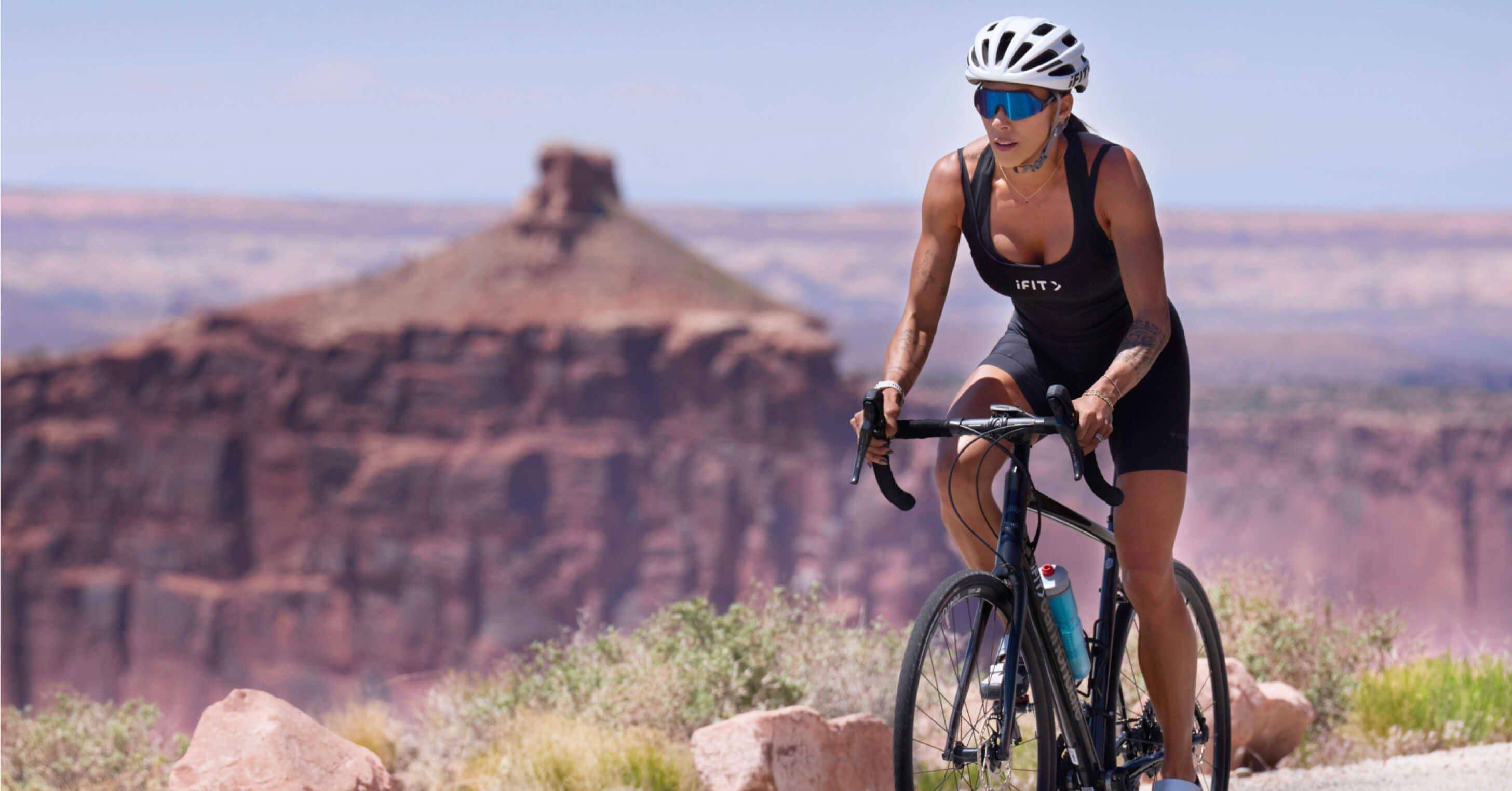 Explore the Canyonlands National Park cycling Challenge on the iFIT app: 6 advanced rides with Hannah Eden and Paulo Barreto.