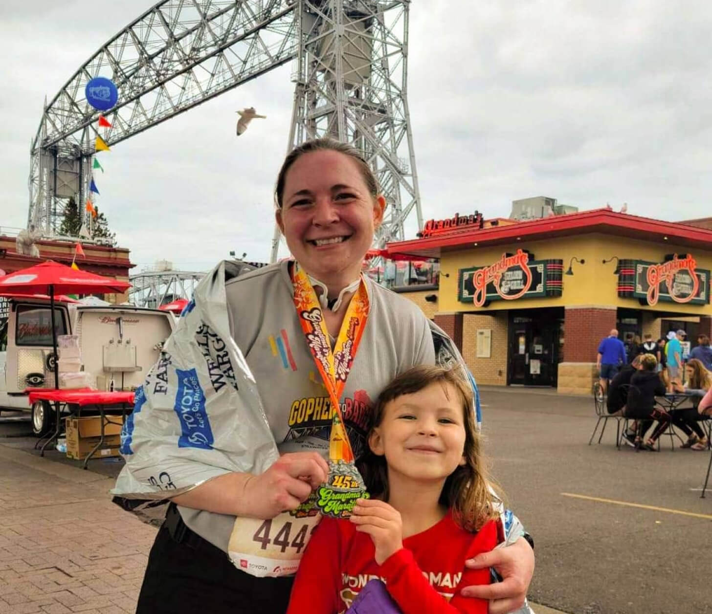 iFIT Member Kathryn Lucht runs a race iFIT Member Kathryn Lucht finishes a race