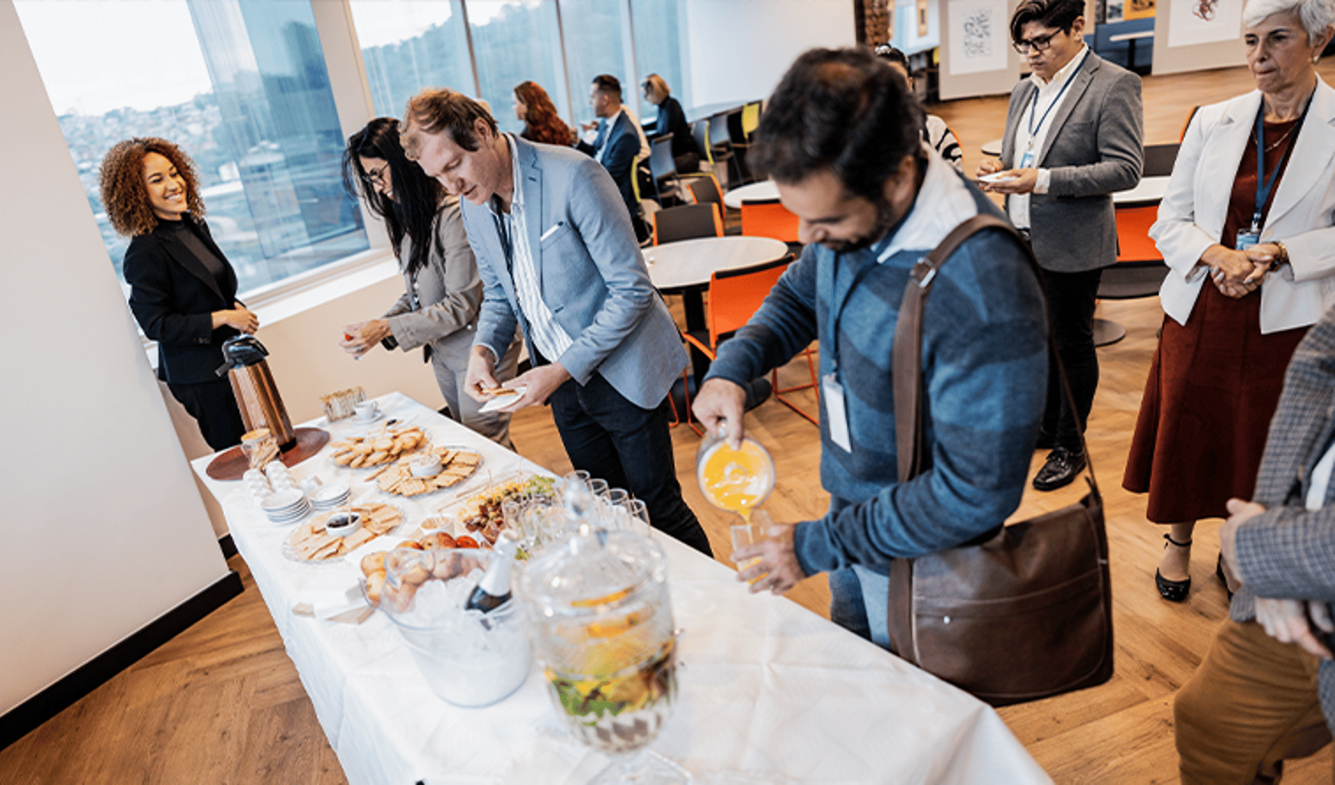 People Moving Through Breakfast Buffet at Hotel