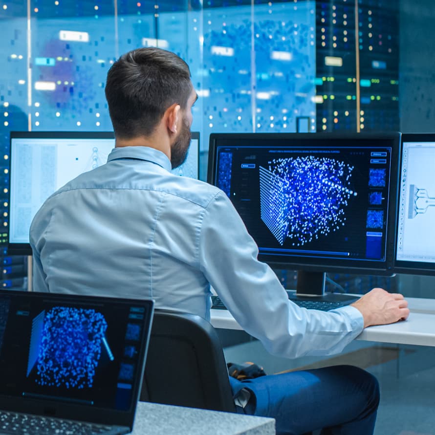 Man in High Tech Office Using a Computer