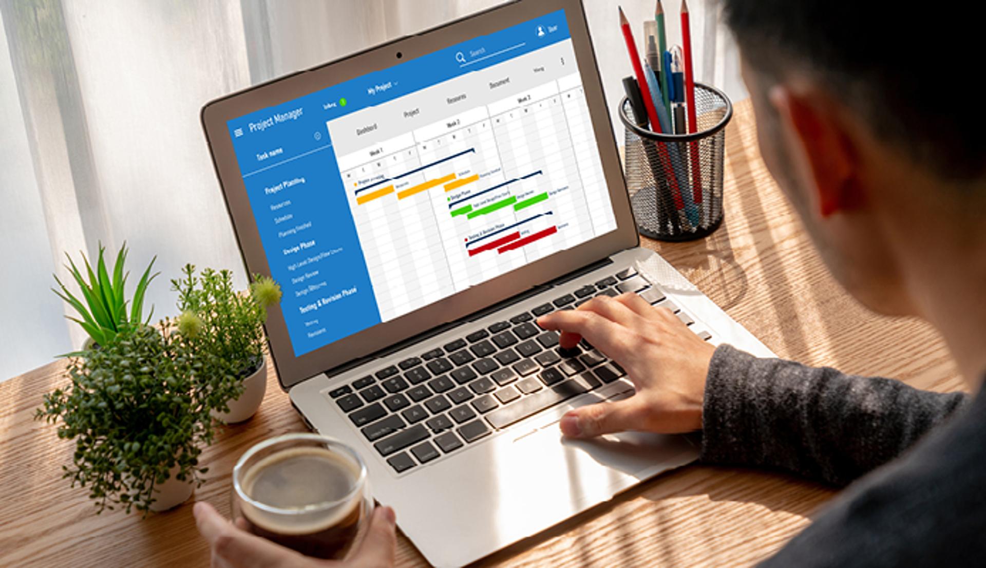 Close Up of Laptop with Project Manager Data