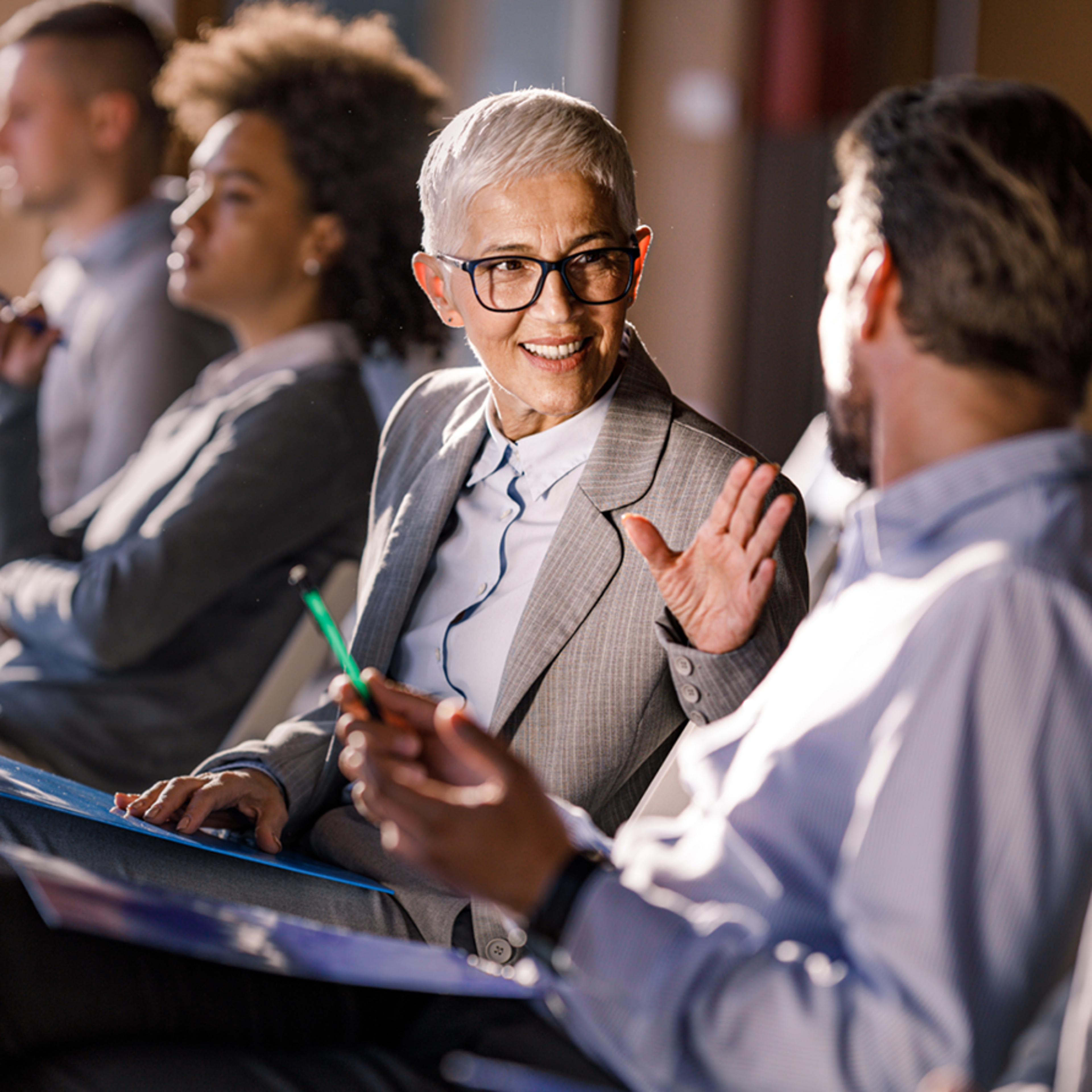 Smiling Woman Talking to Man