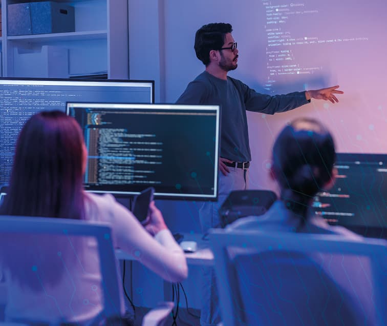 A Teacher Instructing a Room of Students