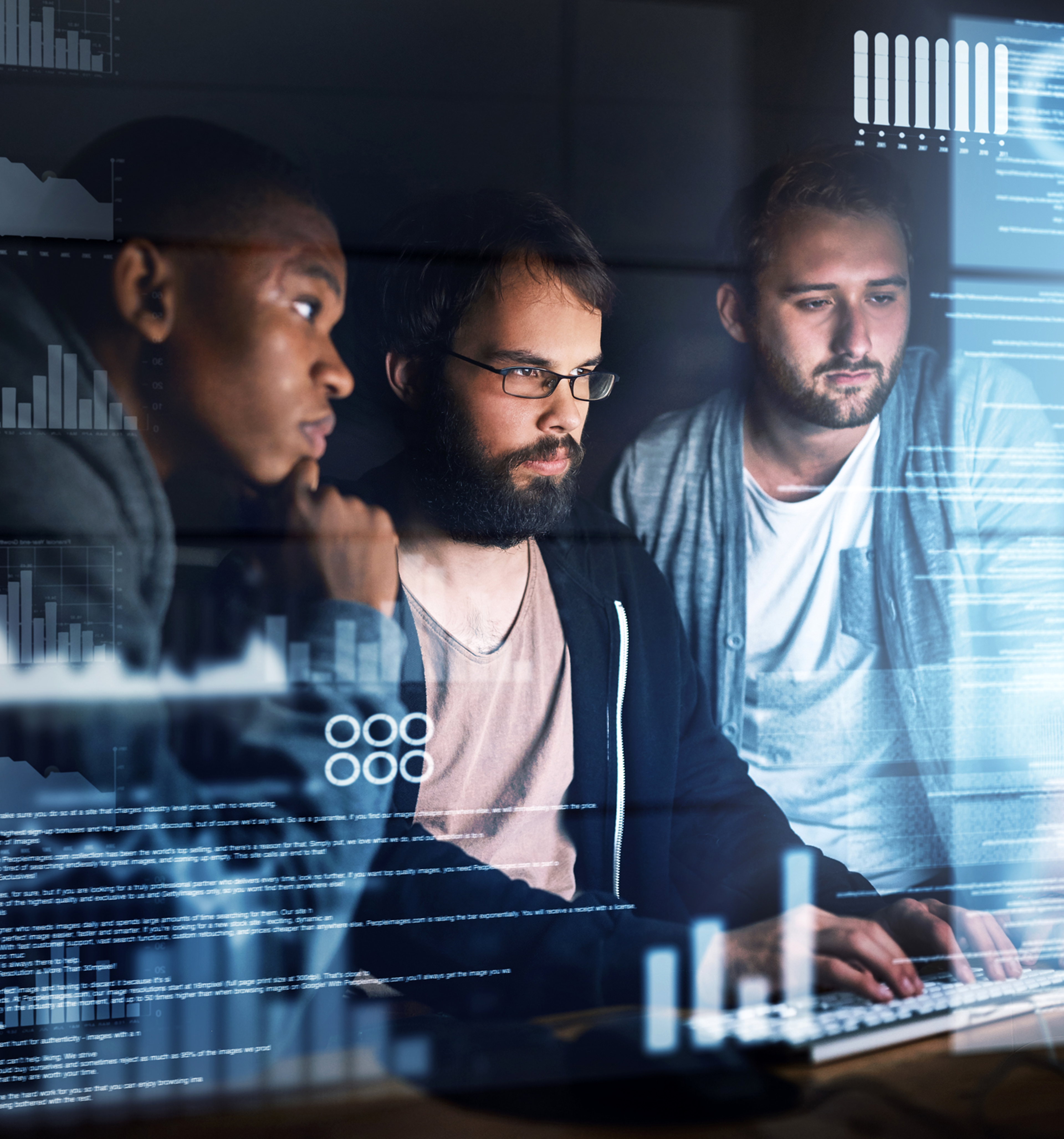 Three People Working Together on A Computer